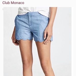 Tailored, scalloped edge denim shorts.